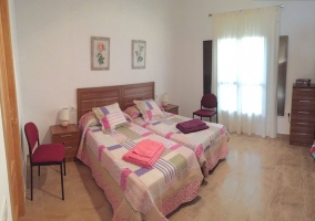 Dormitorio doble con camas individuales