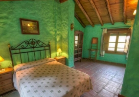 Dormitorio de matrimonio de color verde