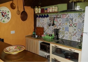 Cocina del apartamento de arriba y menaje