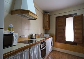 Cocina equipada con electrodomésticos