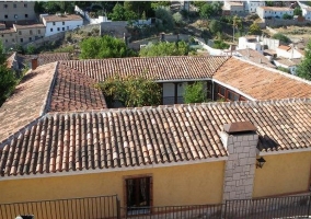 Sala de estar con chimenea de la casa rural