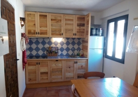 Complete kitchen with wooden furniture