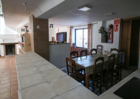 Cocina comedor y la chimenea