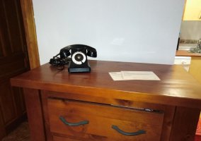 Sala de estar y cocina comunicados