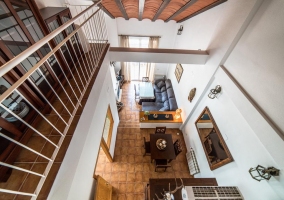 Living room with table and fireplace in the front