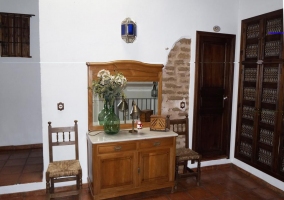Large porch of the house with a table set