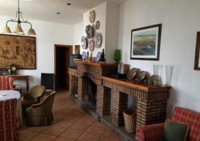 Living room with brick fireplace