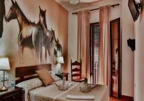 Habitación con balcón
