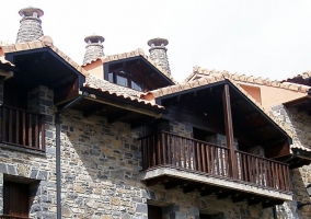 Sala de estar y cocina de uno de los apartamentos