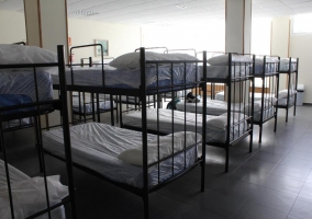Cama en dormitorio mixto
