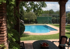 Porche con Comedor junto a la Piscina
