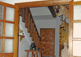 Entrada con hall distribuidor de la casa