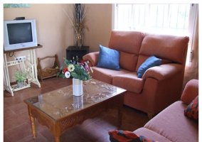 Comedor de madera en la casa rural